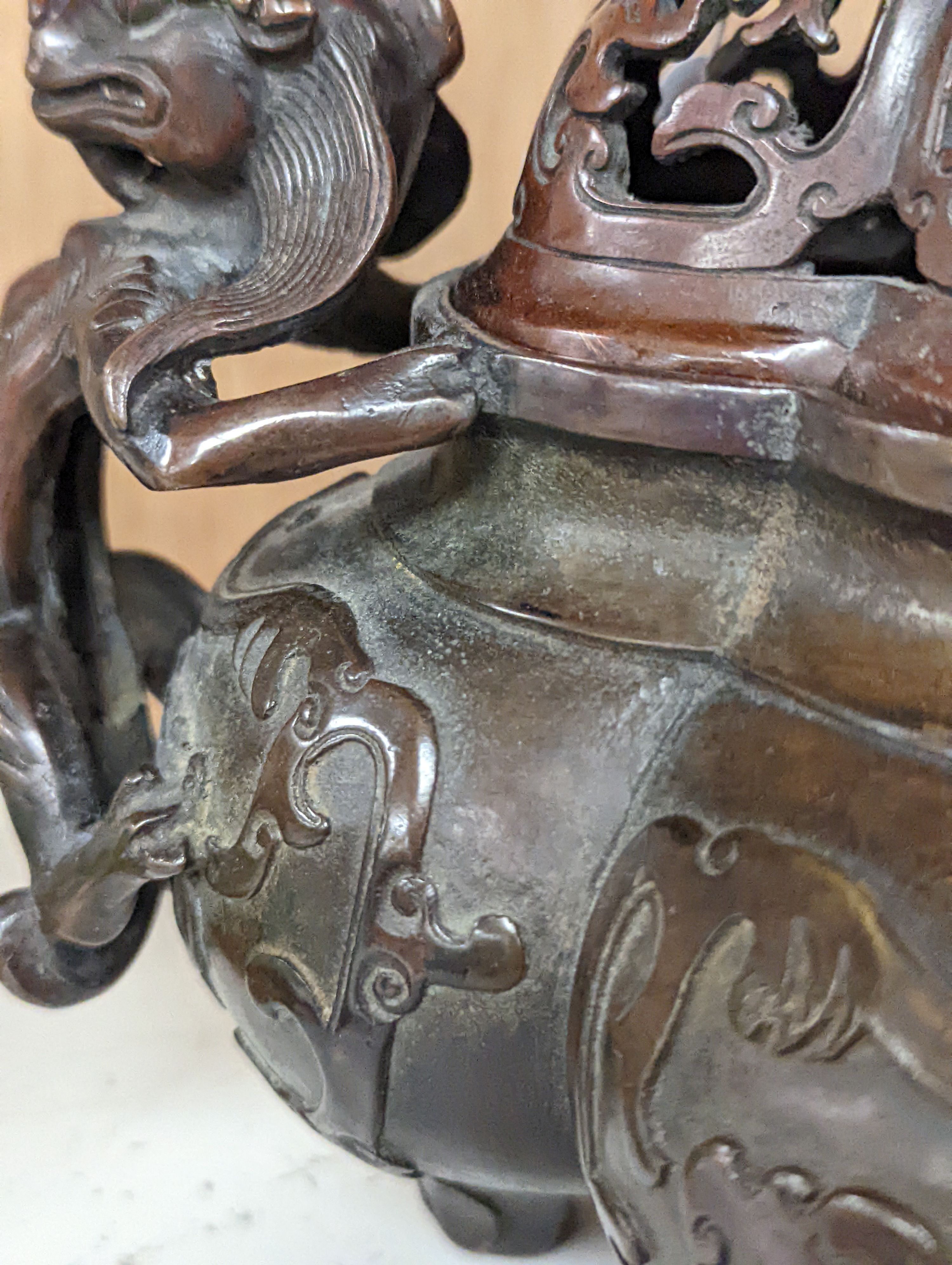 A 19th century Chinese bronze quatrefoil censer, with four character mark - 19cm high